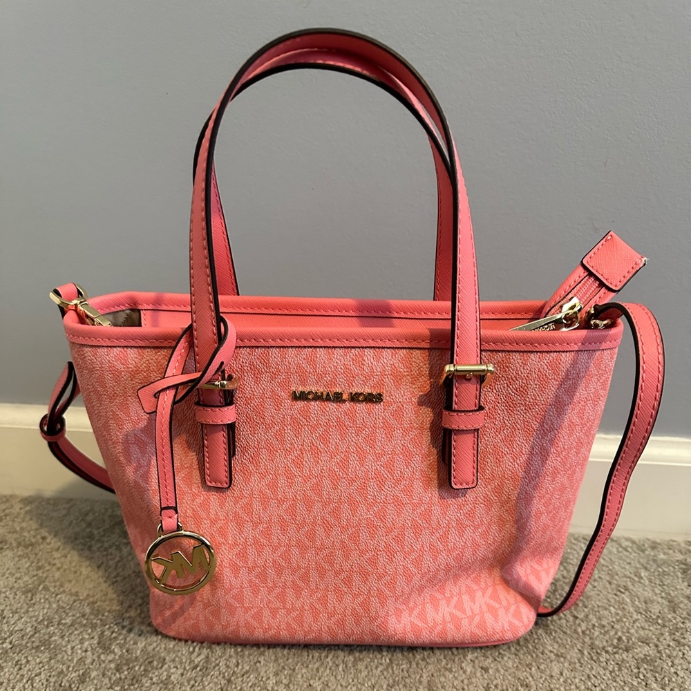 Michael Kors xs jet set travel tote in the color grapefruit